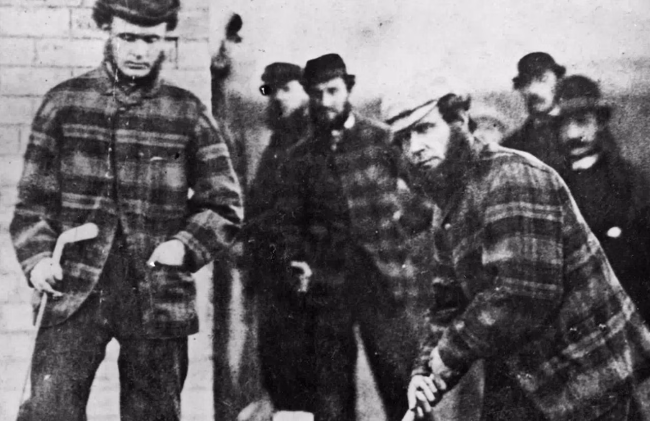Old Tom Morris playing golf at Prestwick in 1860.