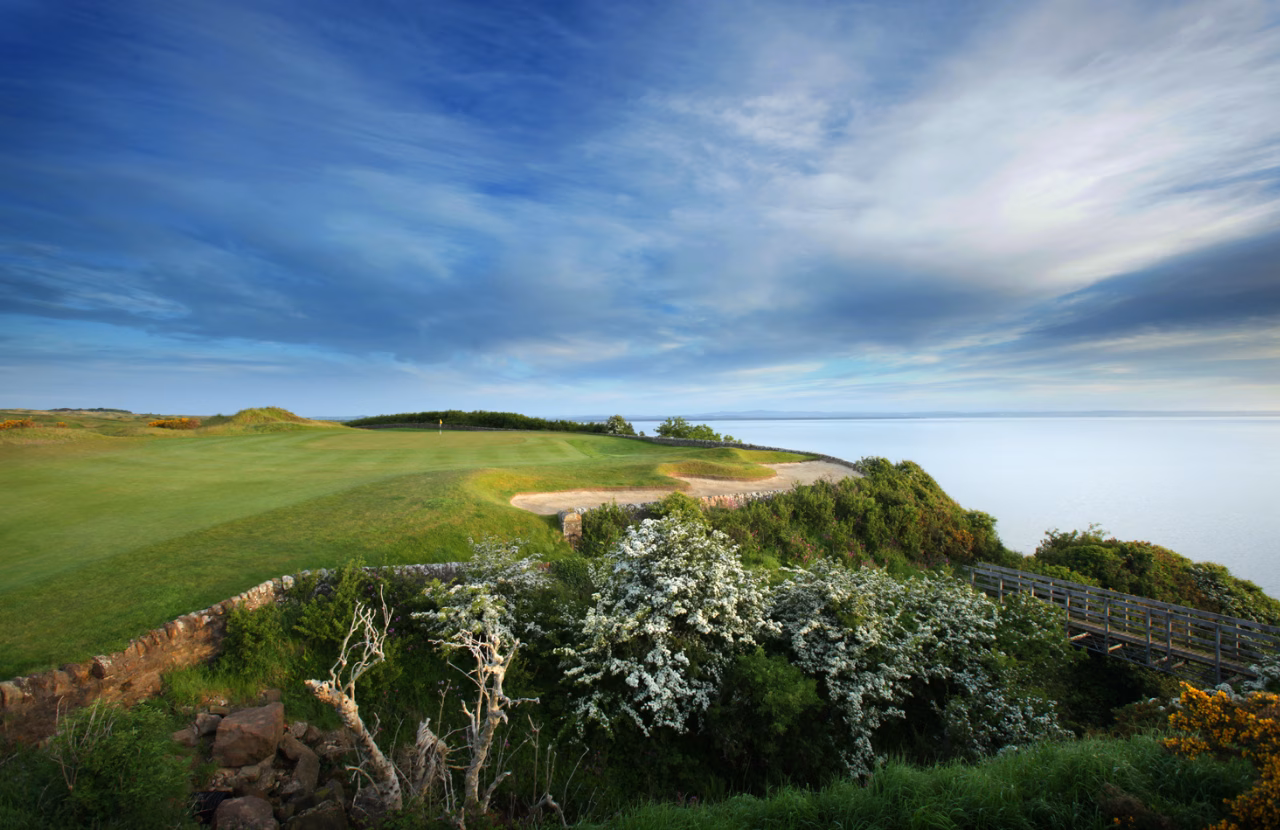 The Kittocks Course with a cliffside green overlooking the sea.
