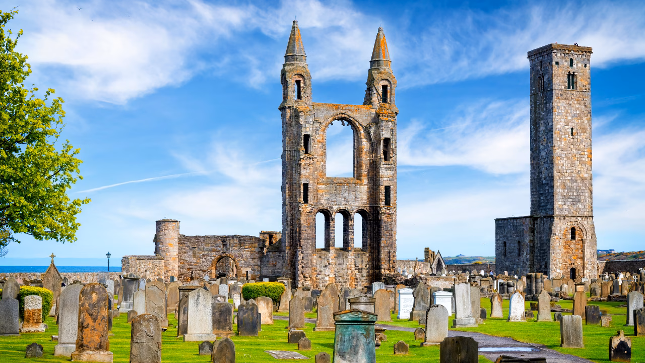 St Andrews Cathedral ruins with St Rule's Tower rising beside the historic graveyard.