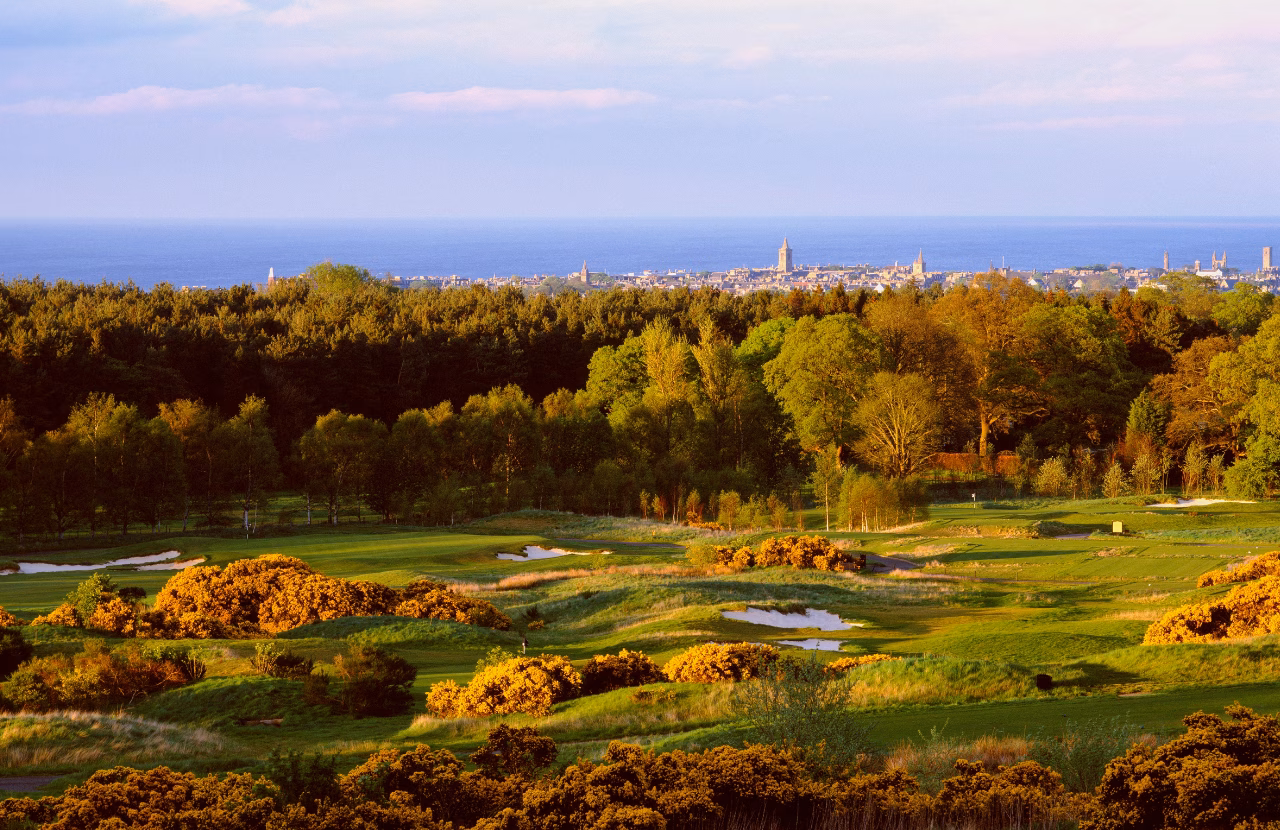 The Craigtoun Course across rolling inland terrain with St Andrews visible beyond.
