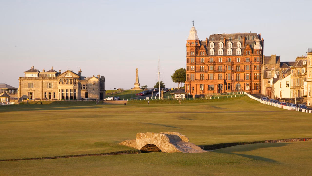 St Andrews Links (Old Course) with the Swilcan Bridge and St Andrews buildings beyond.